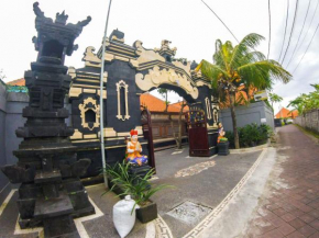 Отель Putu Guest House  North Kuta